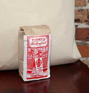 brown small coffee bag with Mothers restaurant red print